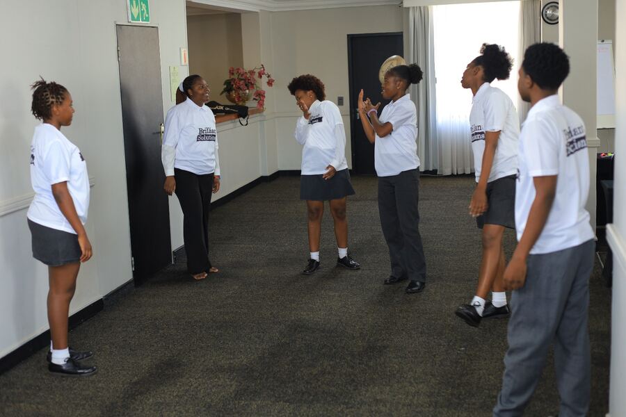 Learners in a guided mentorship session